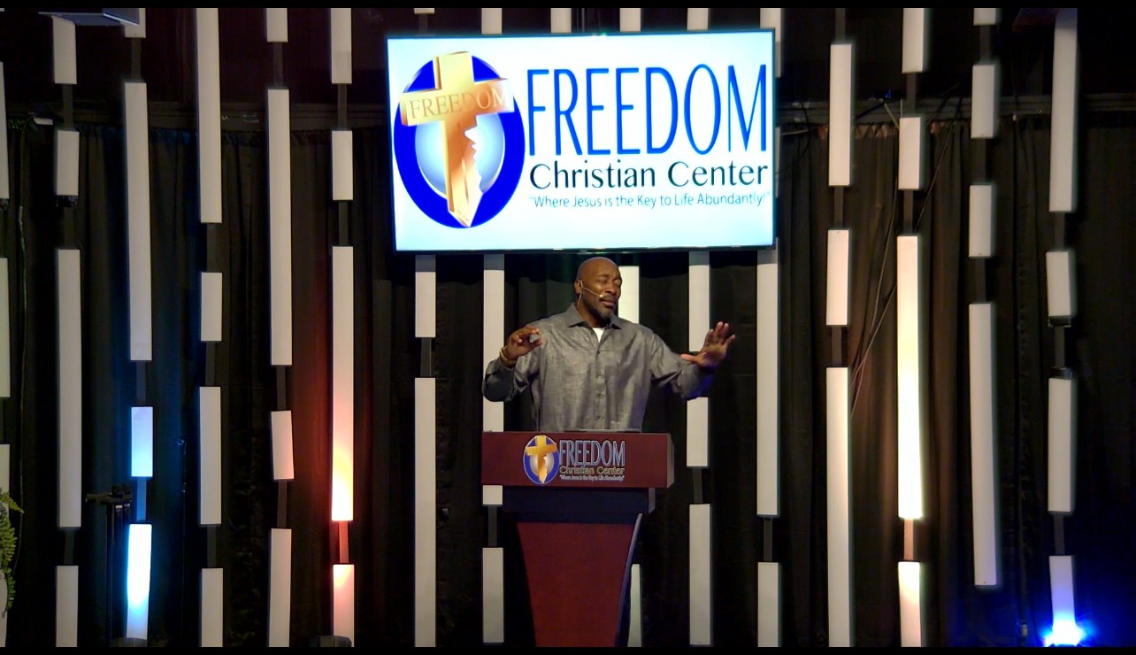 Pastor Shannon preaching at Freedom Christian Center